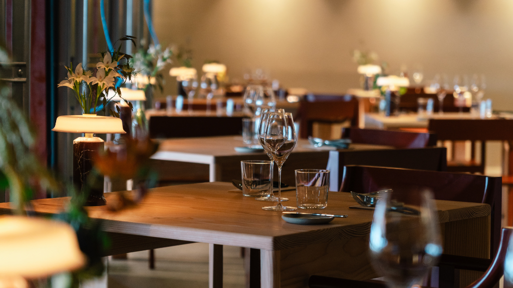 Close-up of tables and glasses at Betty Gilleleje Restaurant