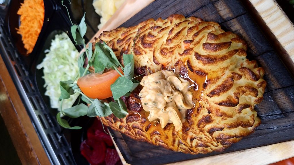 Gårdhave der oser af sydlandsk stemning