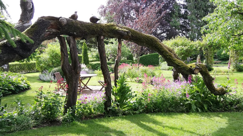 Blomsterpark træskulptur Kræmmerhuset