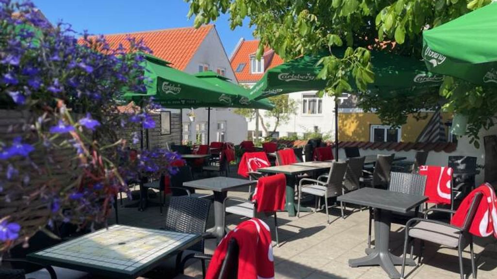 Gårdhave der oser af sydlandsk stemning