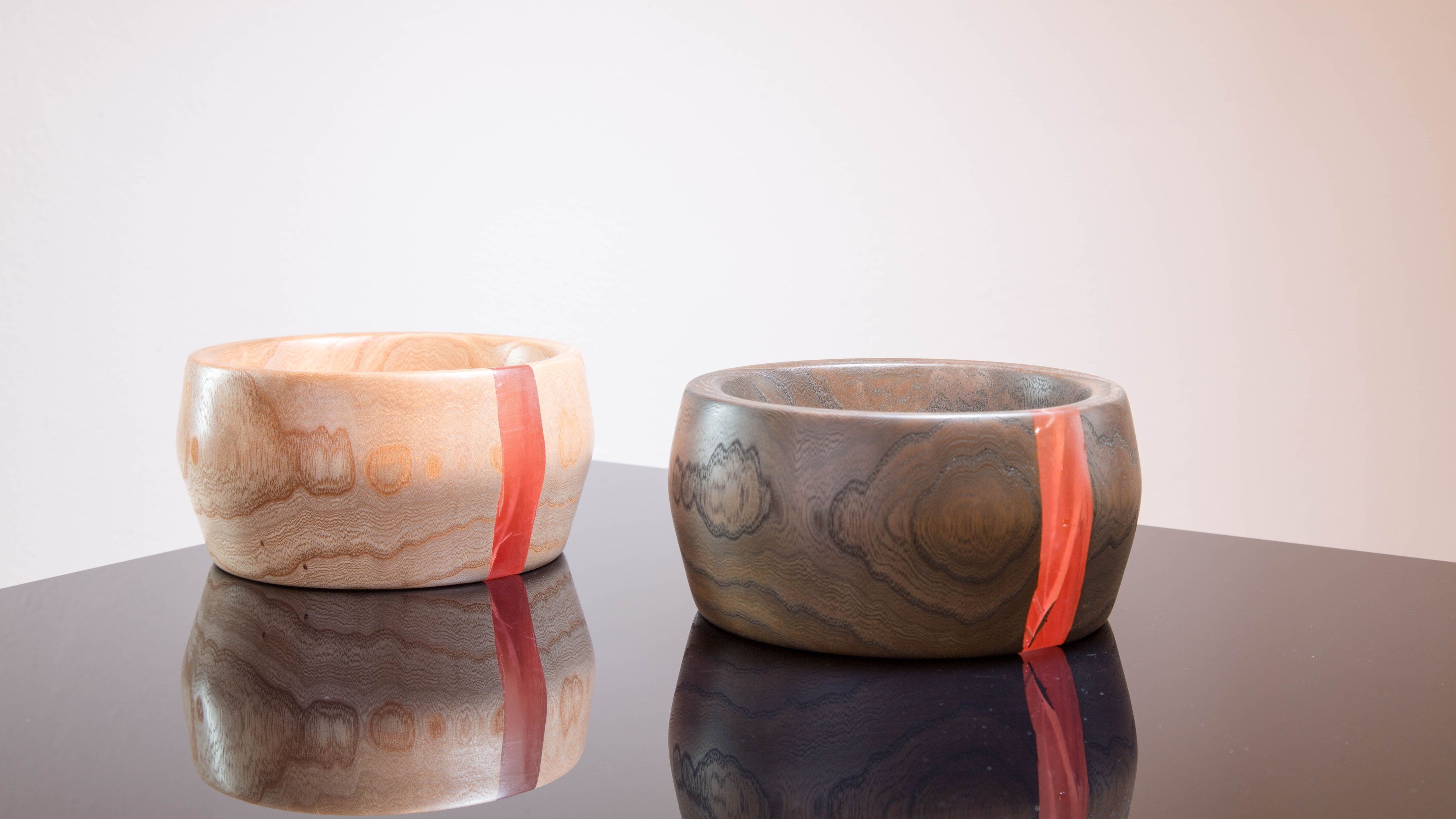 Red-striped wooden bowls
