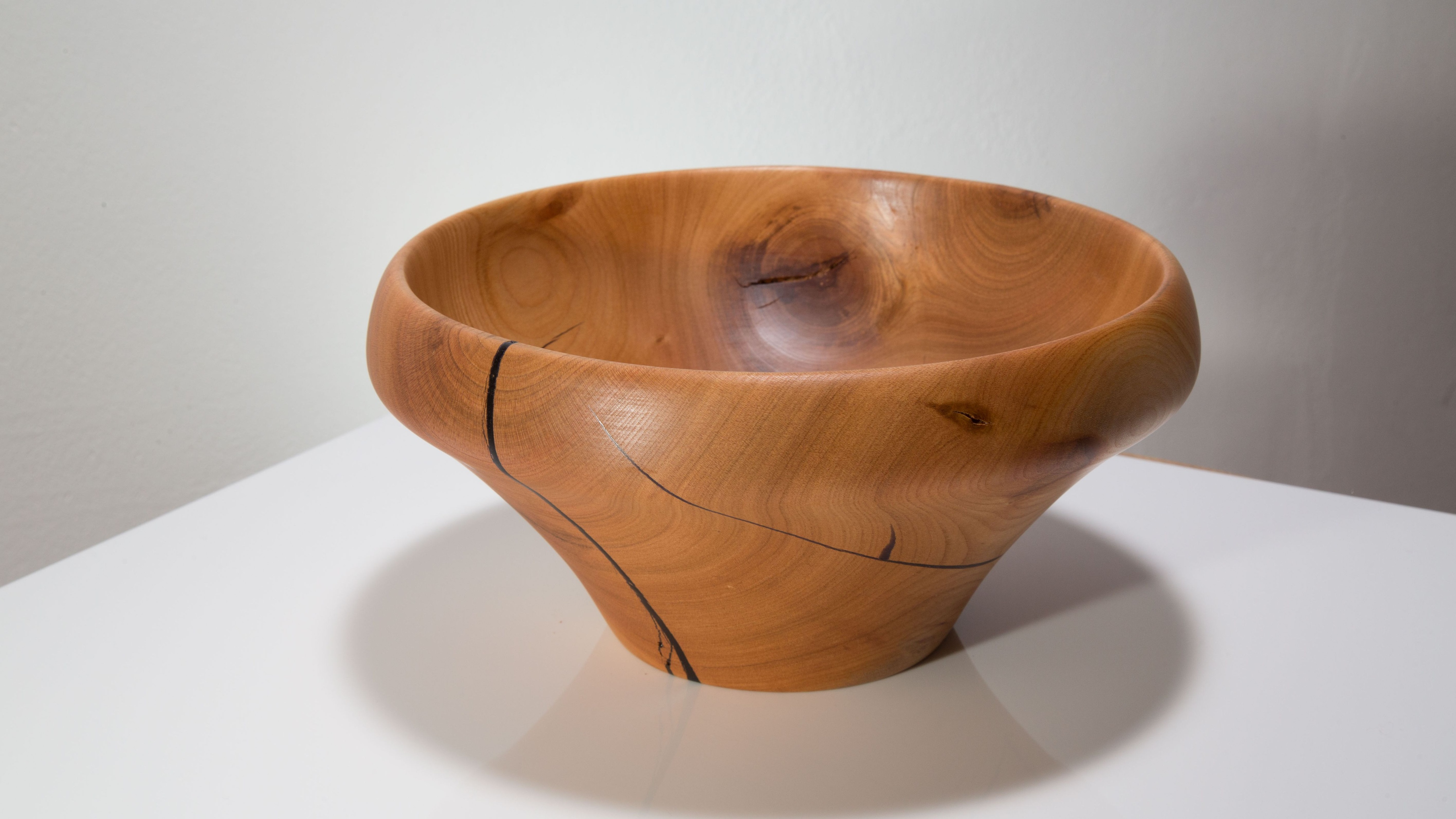 Wood bowl with dark grain