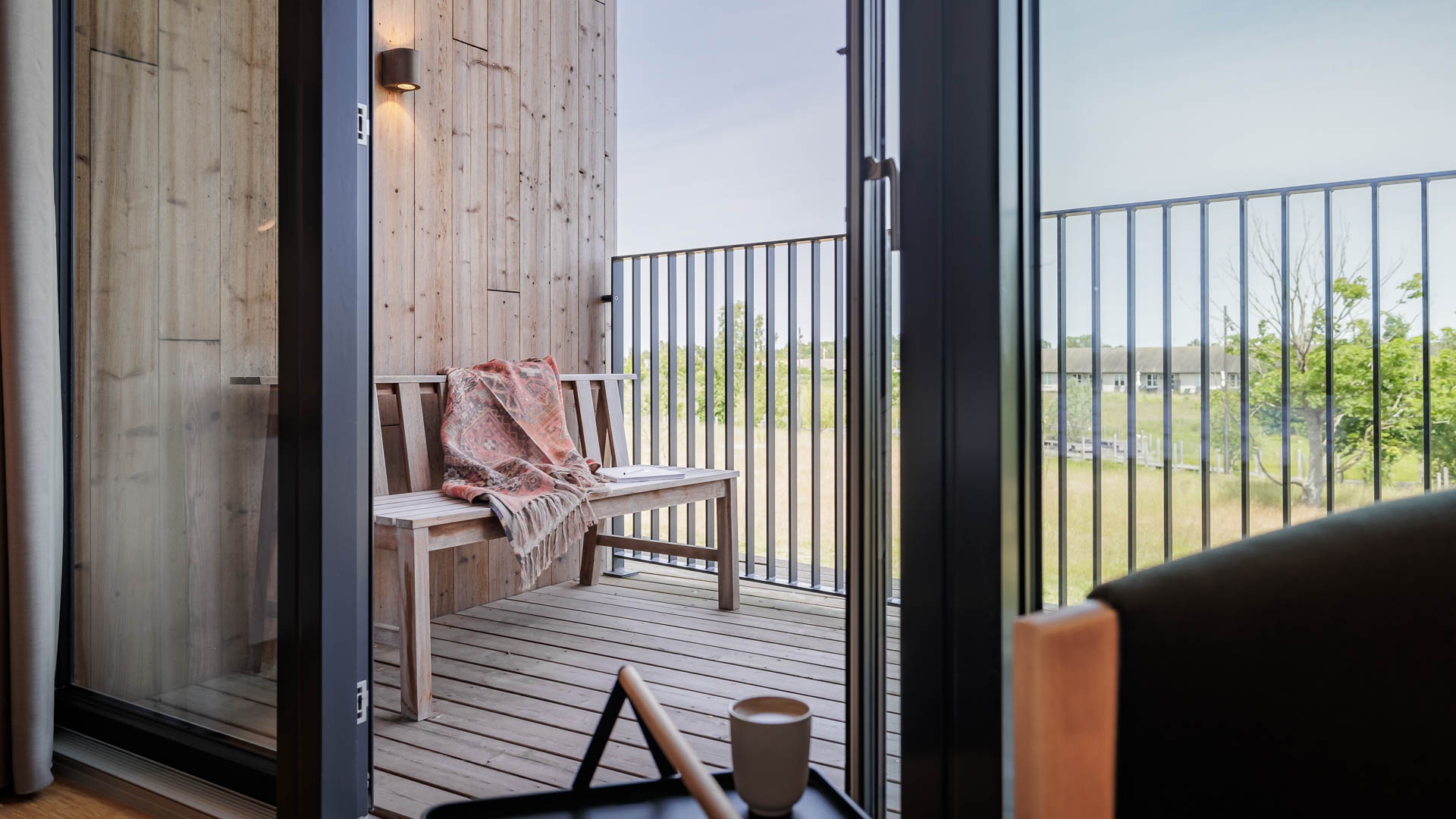 Balcony with wooden bench