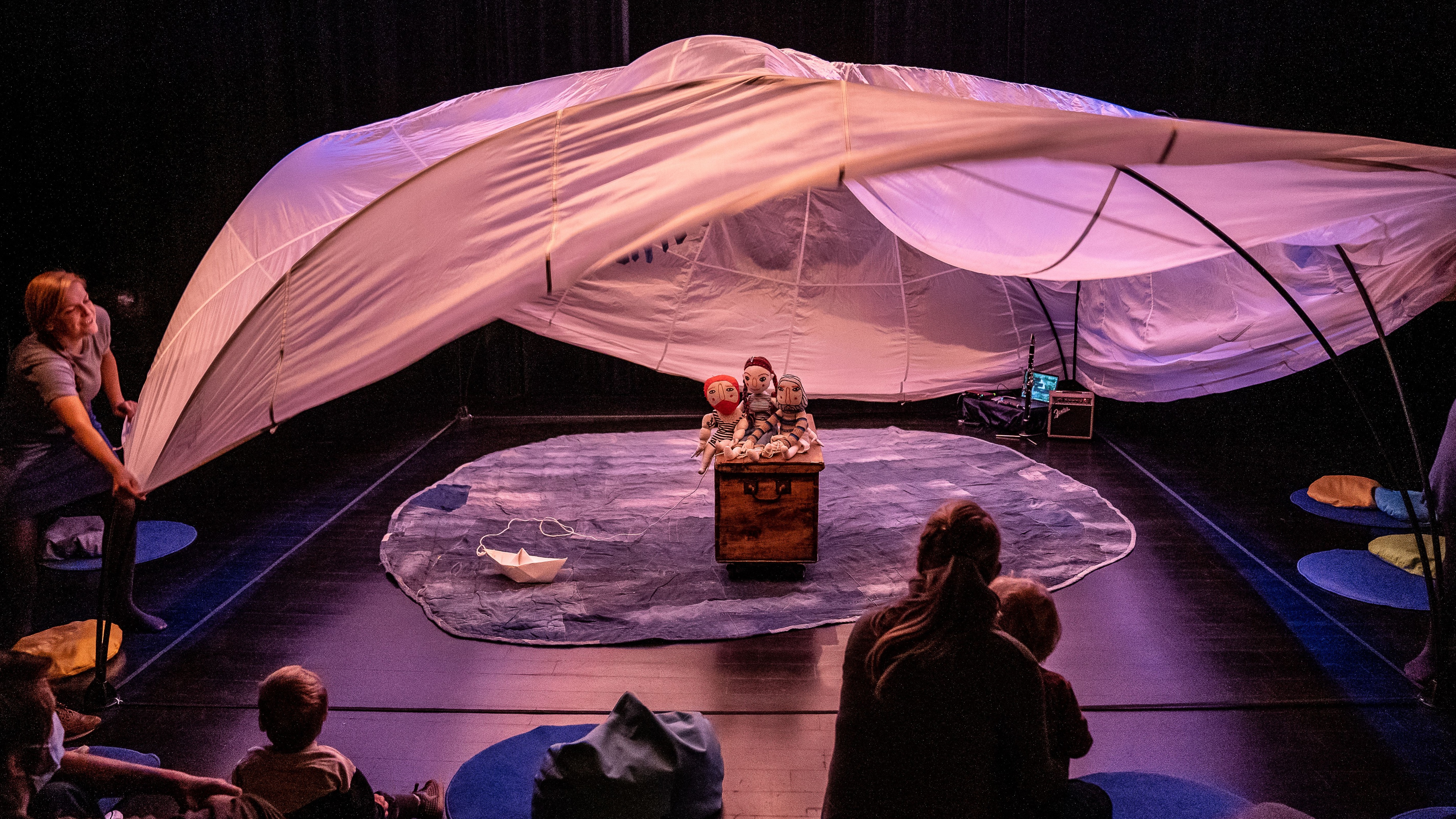 Puppets under tent canvas