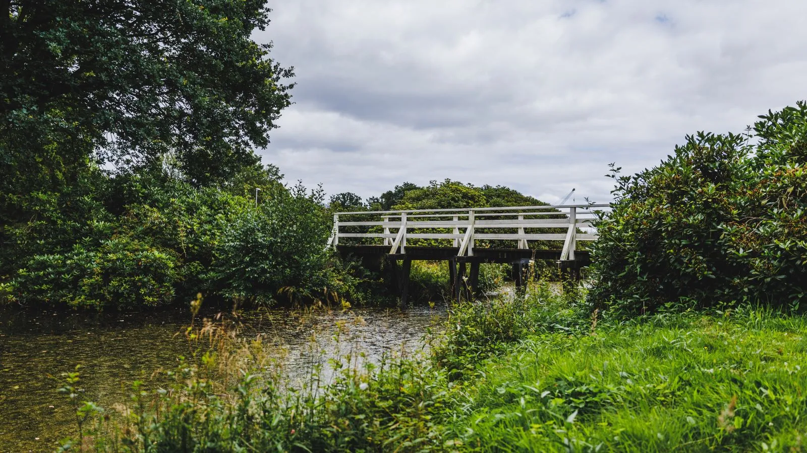 White bridge over a lake at Hannerup.