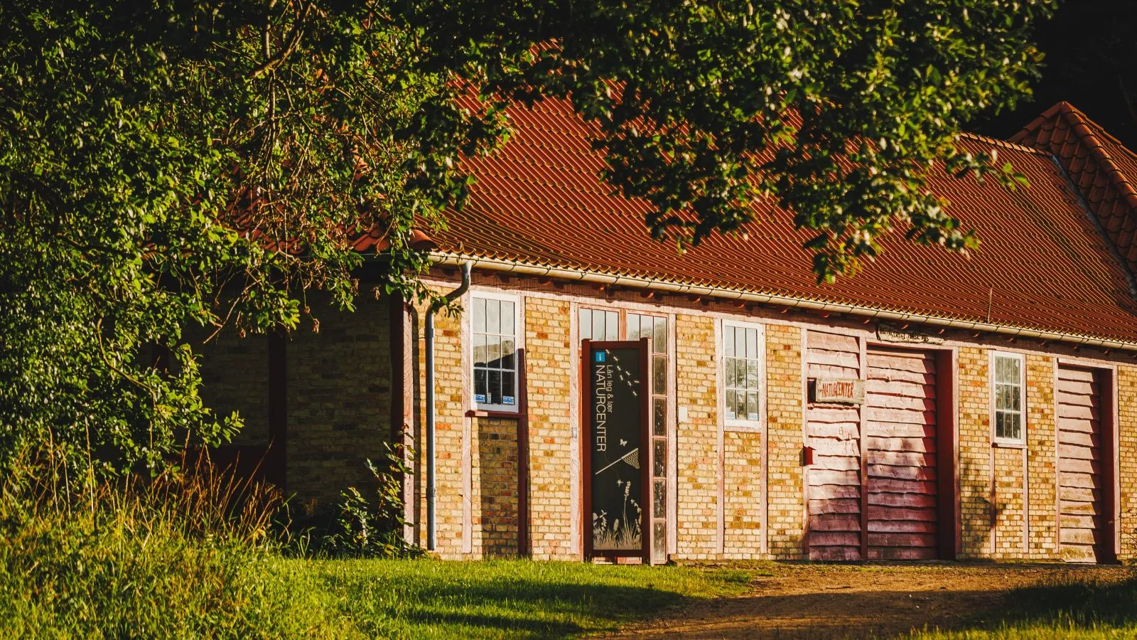 Nature Center Trelde Næs in the evening sun. It is summer.
