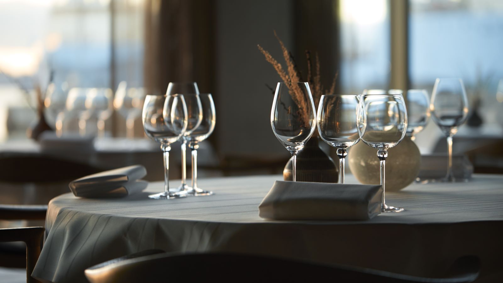 Wine glasses on the table at the restaurant Ti Trin Ned.