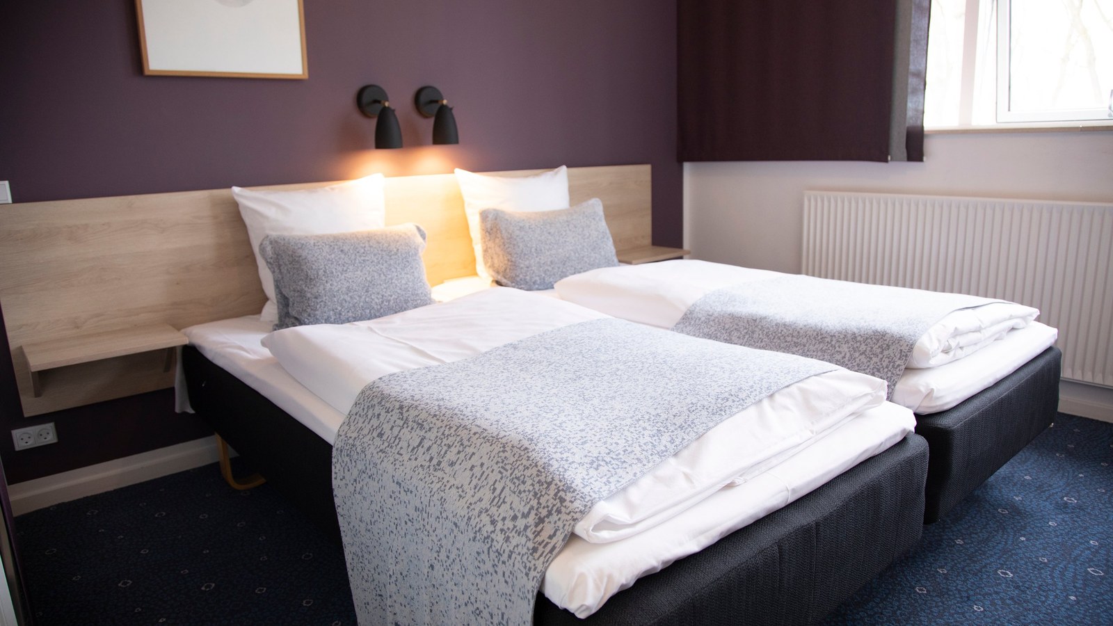 Værelse med to senge på Hotel Strandparken