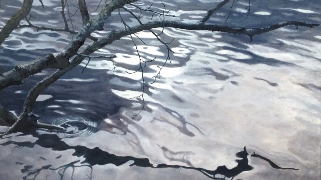 Nature motif with water reflecting the sky by Anne Berit Brogaard.