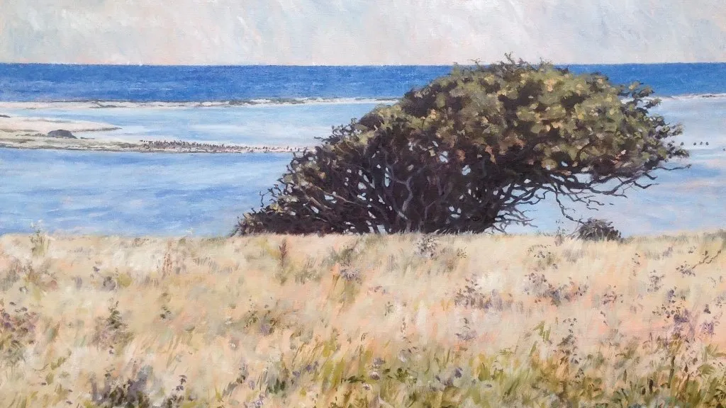 Nature motif with a view of field and sea by Anne Berit Brogaard.
