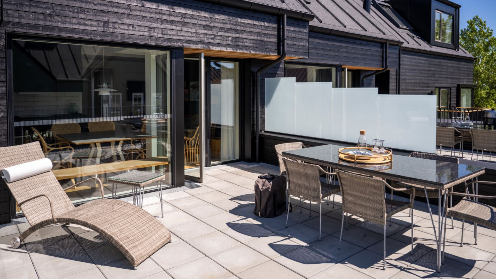 Rooftop terrace with outdoor furniture at harbour apartment in Kerteminde.