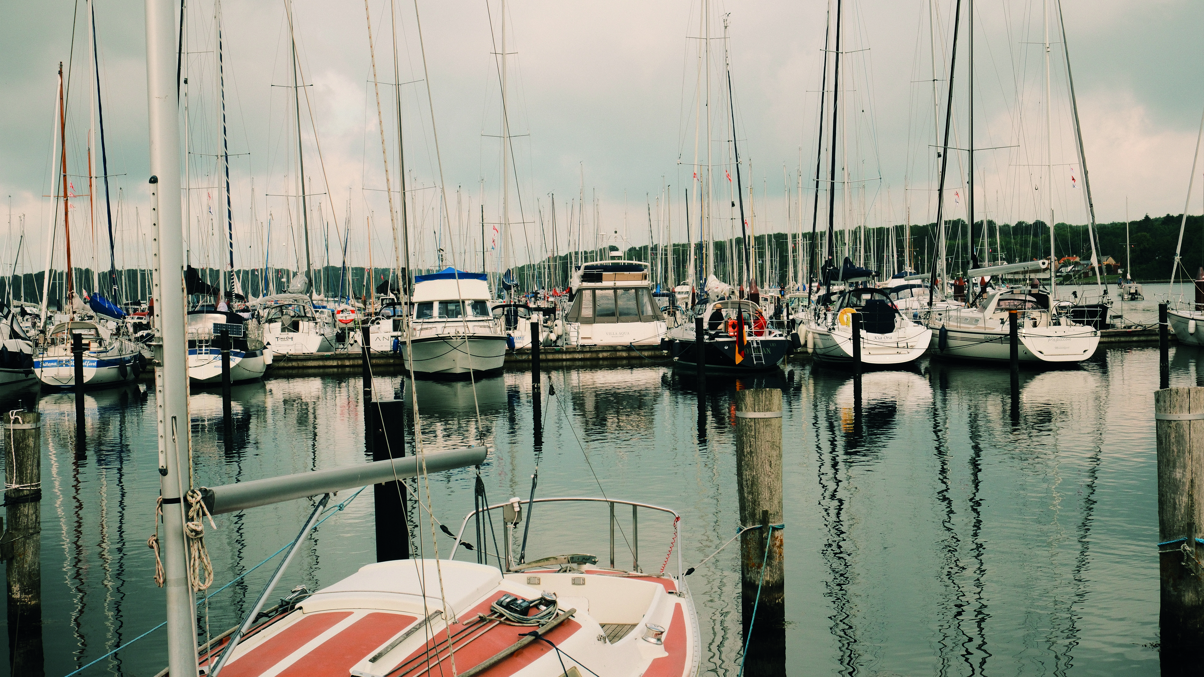 the ports at middelfart marina. The harbor is full of sailboats