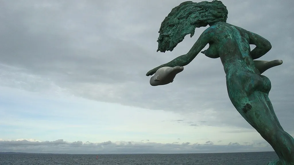 the sculpture of the mermaid Elle overlooking the sea