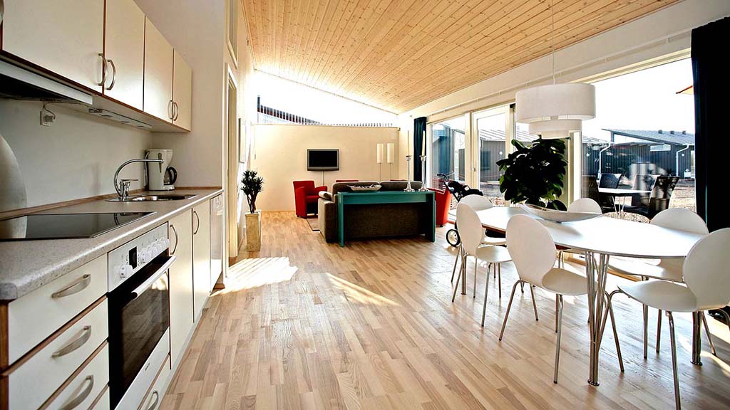 Kitchen and open plan living room in one of the holiday homes at Bogense Golf
