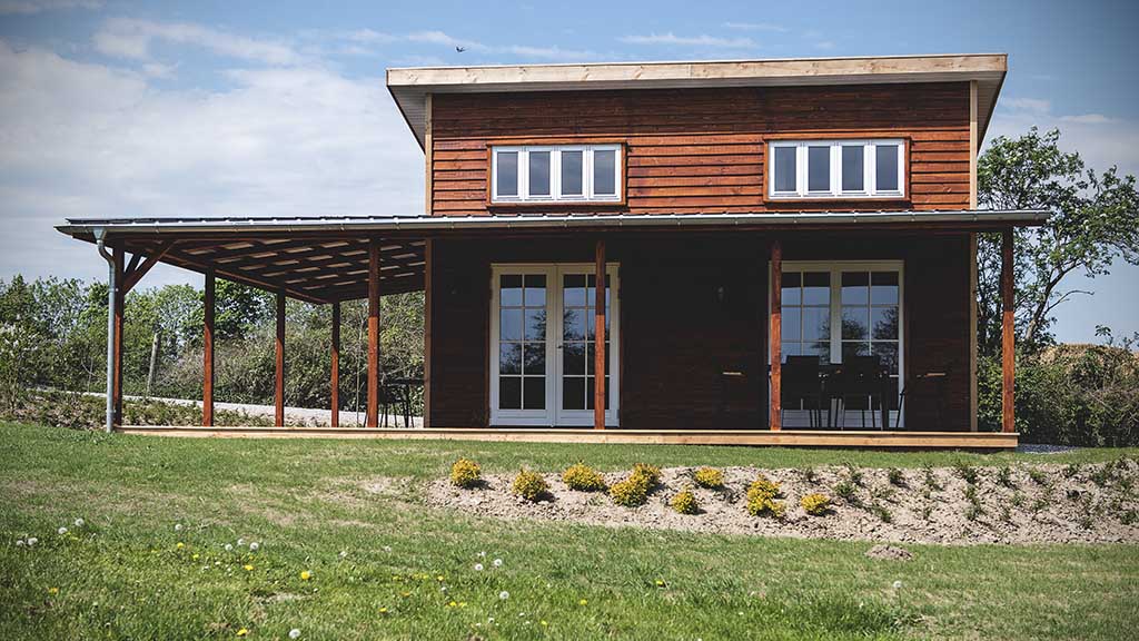 Et af præriehusene du kan leje hos Ditlevsdal Bison Farm