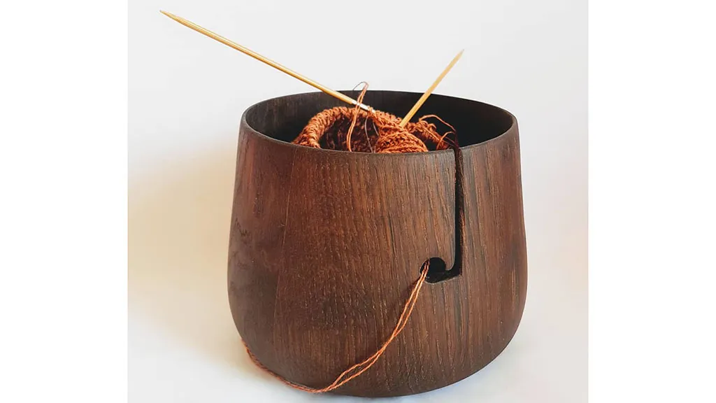 Wooden bowl for yarn and knitting needles
