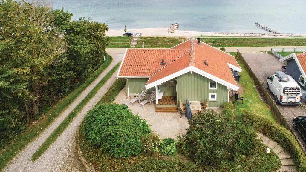 Campaya Sommerhusudlejning vermietet Sommerhäuser mit Meerblick