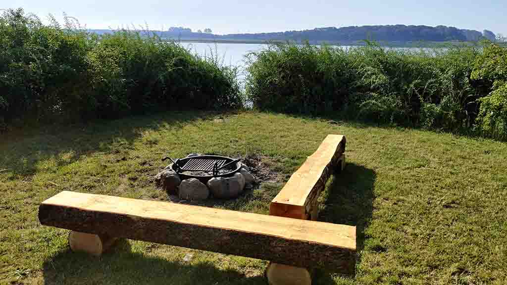Campfire with a view of the water at the shelters on Klintebjerg