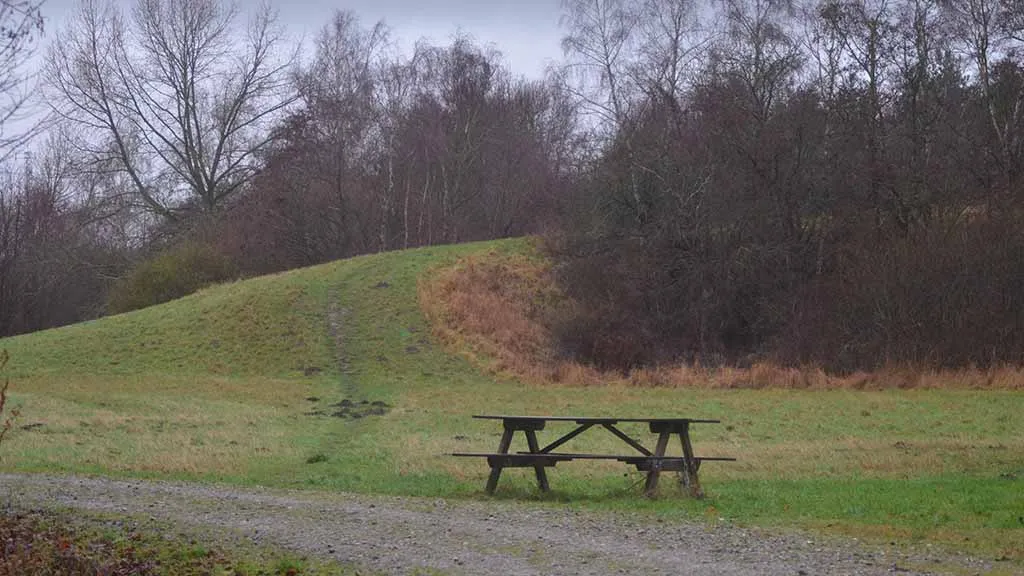 Picnic table by the hill in Otterup forest in January