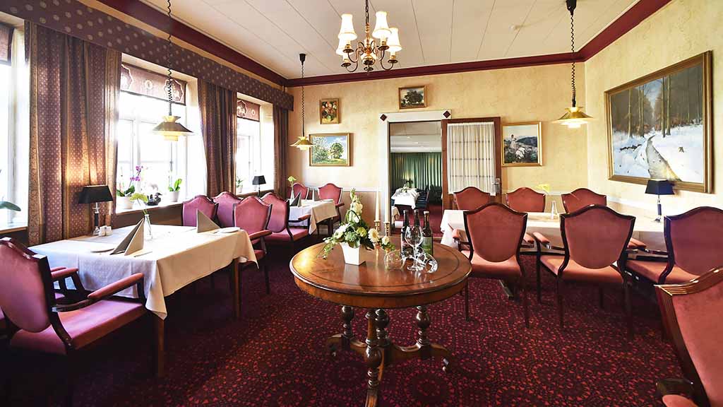 Bogense Hotel Restaurant has many tables ready for guests