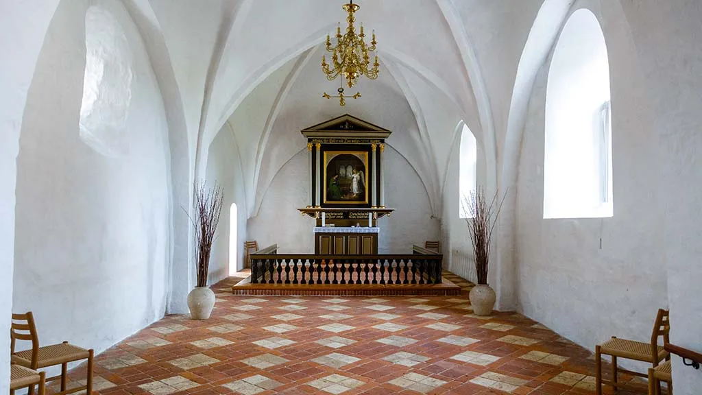 Hårslev Church from the inside with the altarpiece in the middle