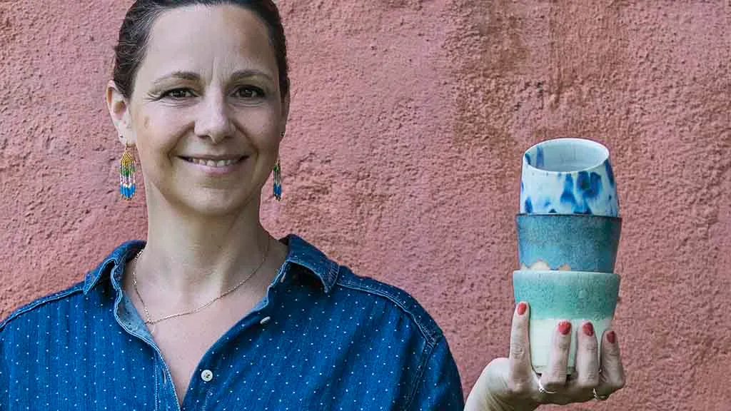 Designer Trine Søgaard with her ceramic mugs