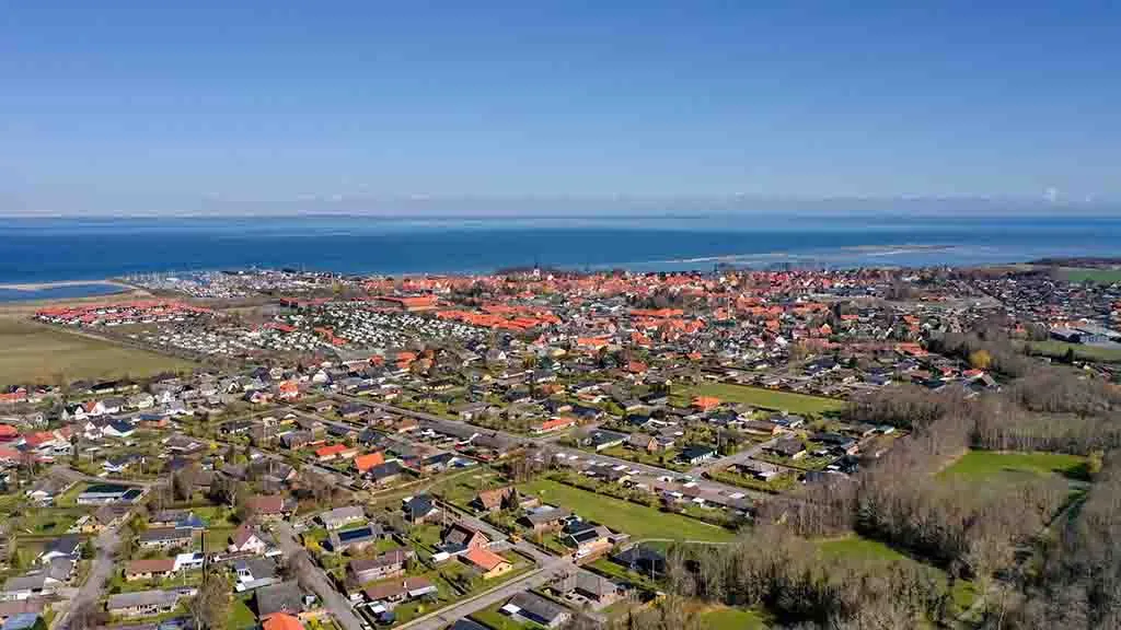 Bogense from the air - with the city and harbor in focus