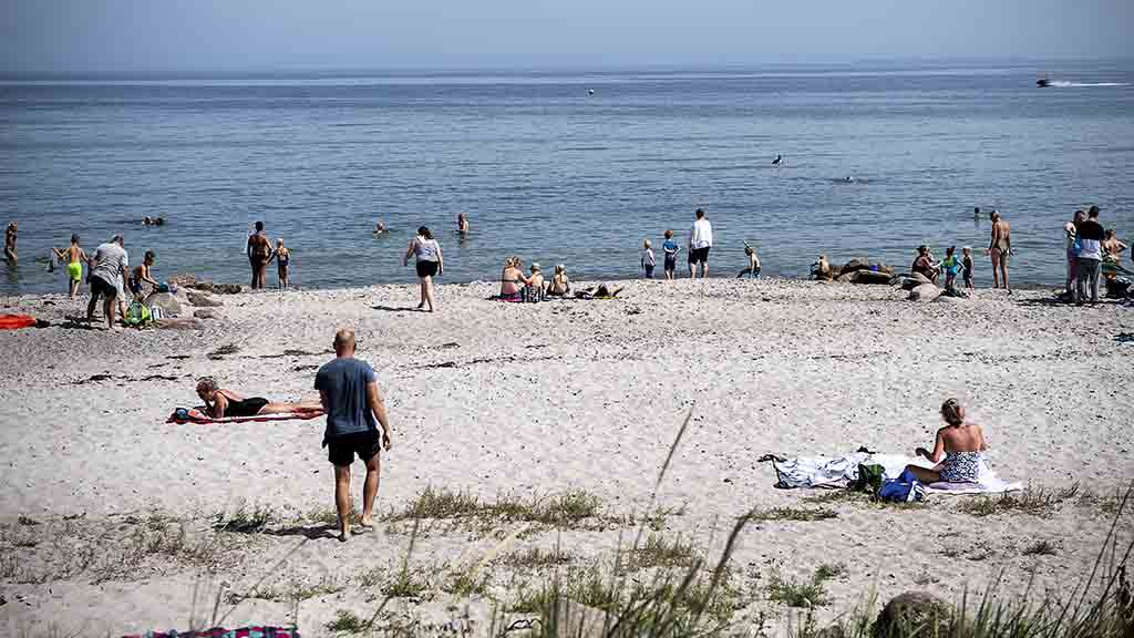 People are enjoying the sun on Hasmark Beach