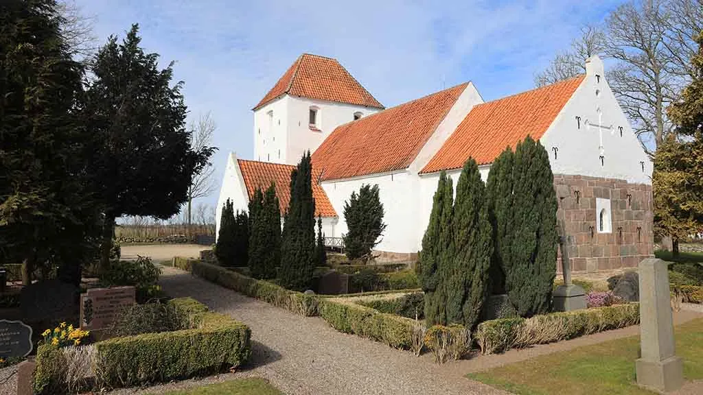 Ejlby Church and the cemetery seen from the side