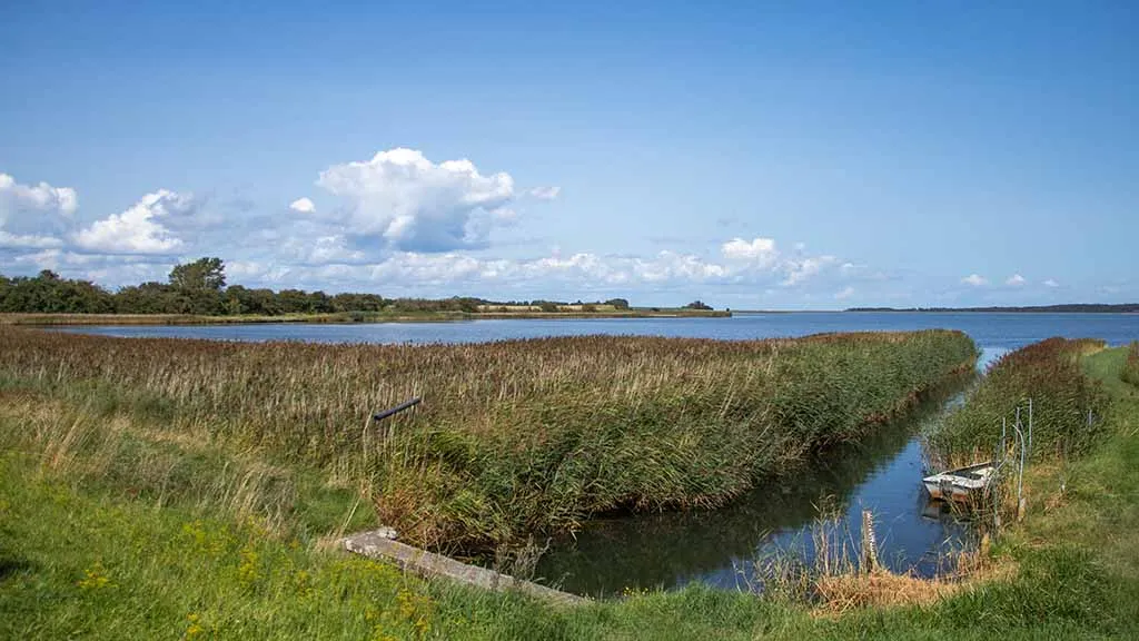 Nærå Strand with the water channel in the late summer sun