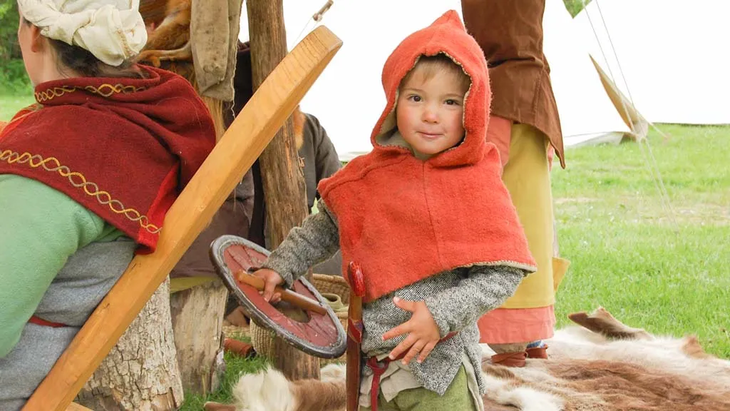 Little boy in the Iron Age village