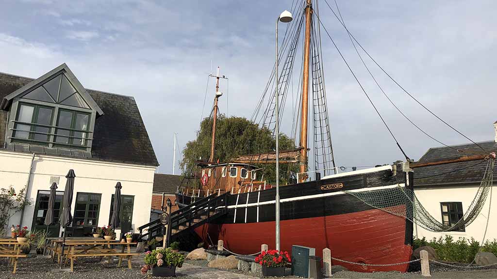 The ship Castor next to Castor Street Food at Bogense Harbour