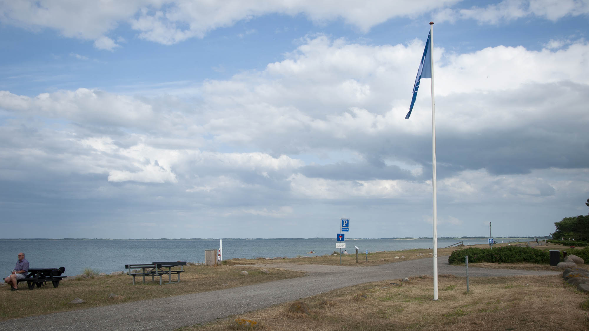 The blue flag at Hofmansgave Beach near Enebærodde