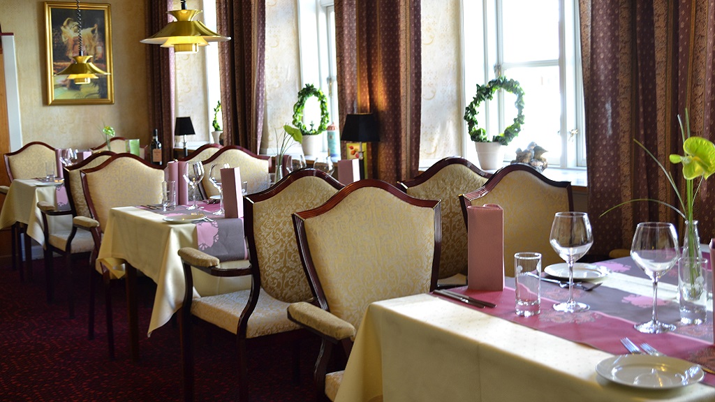 Dining is available in the hotel's own restaurant