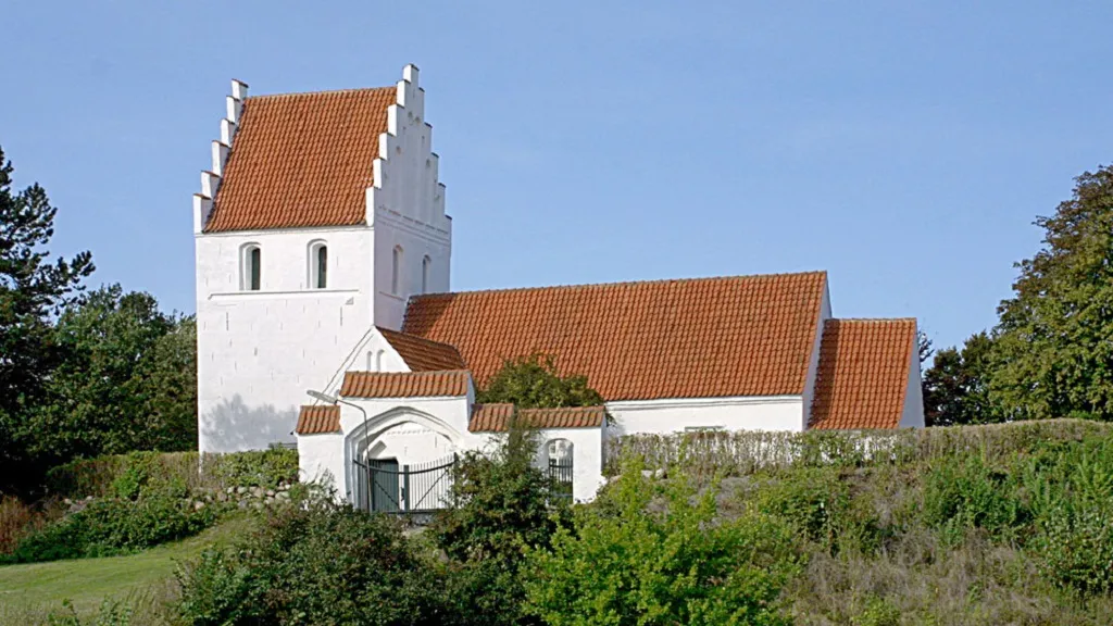Guldbjerg Church seen from down the hill towards the church and the cemetery gate