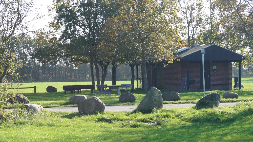 Green area with picnic tables by Fuglsang Strand