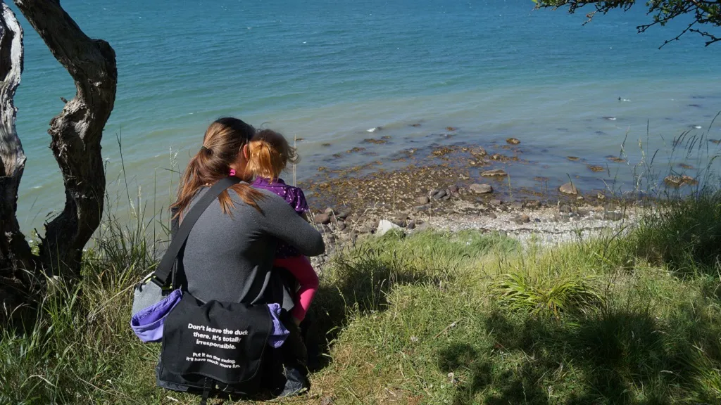 Mother and daughter enjoy each other's company and the beautiful view from Æbelø
