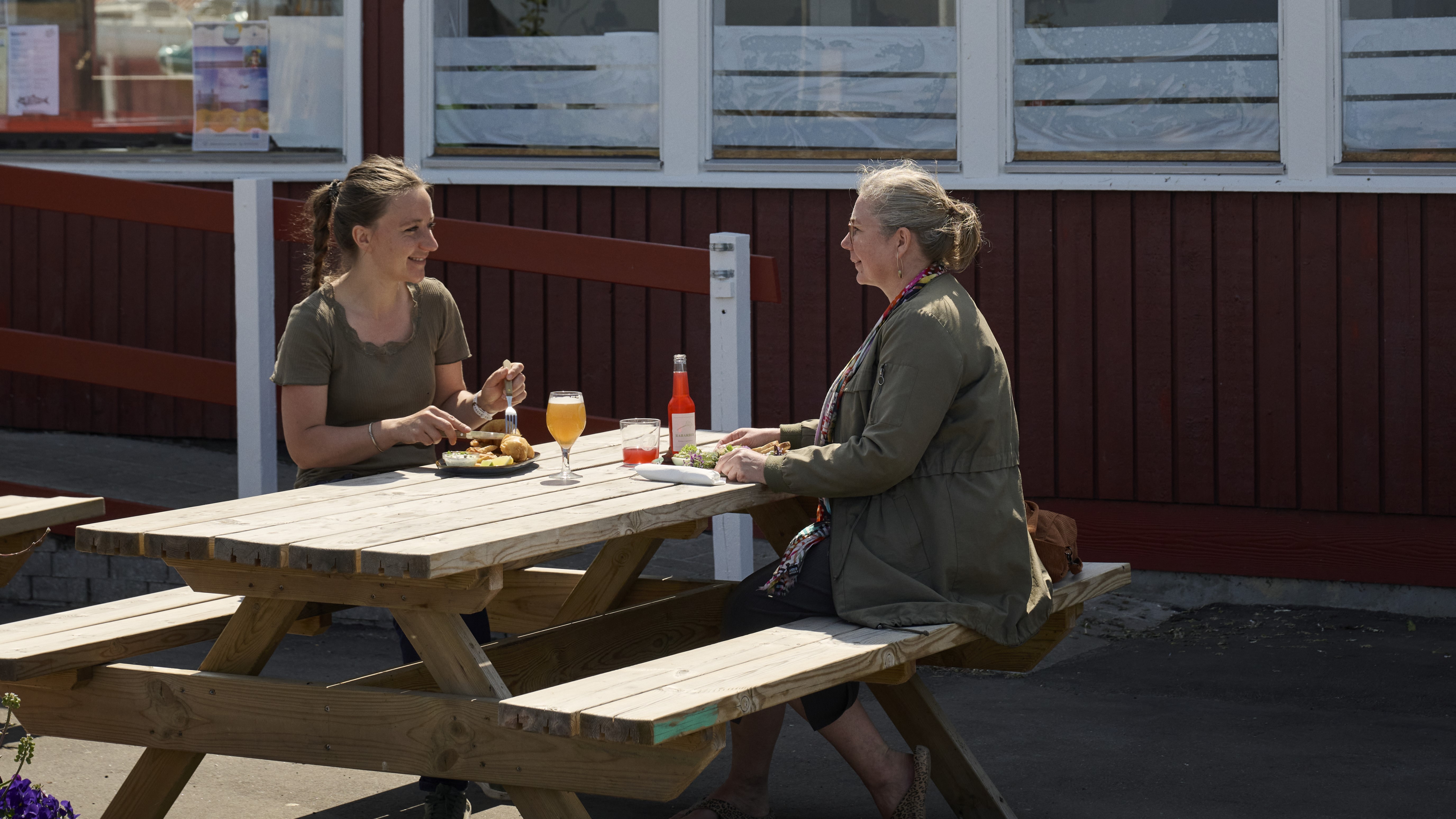 Two people eating at Langø Grill & Fiskebar