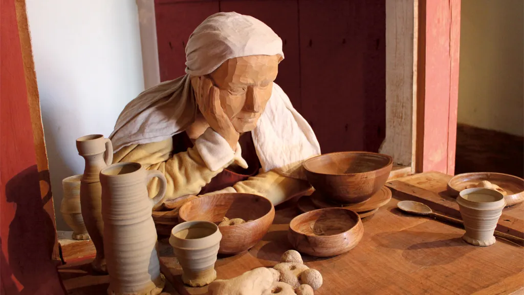 Lady at table in the exhibition at Ribe's Vikings