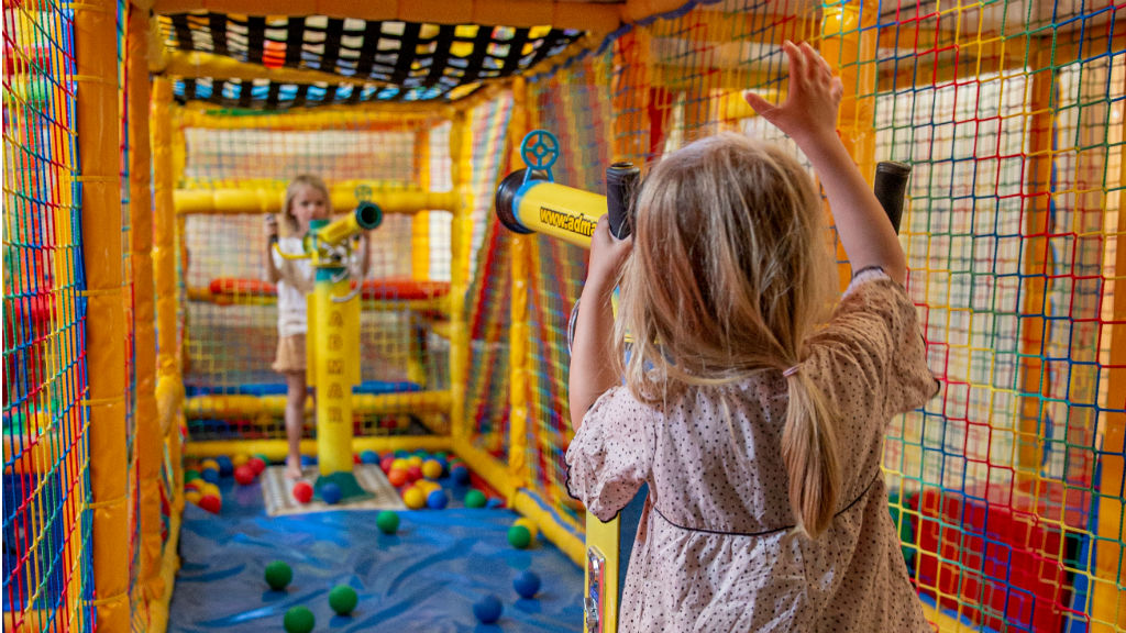 Play with your friends in the playground at Rødgaard Camping Fanø