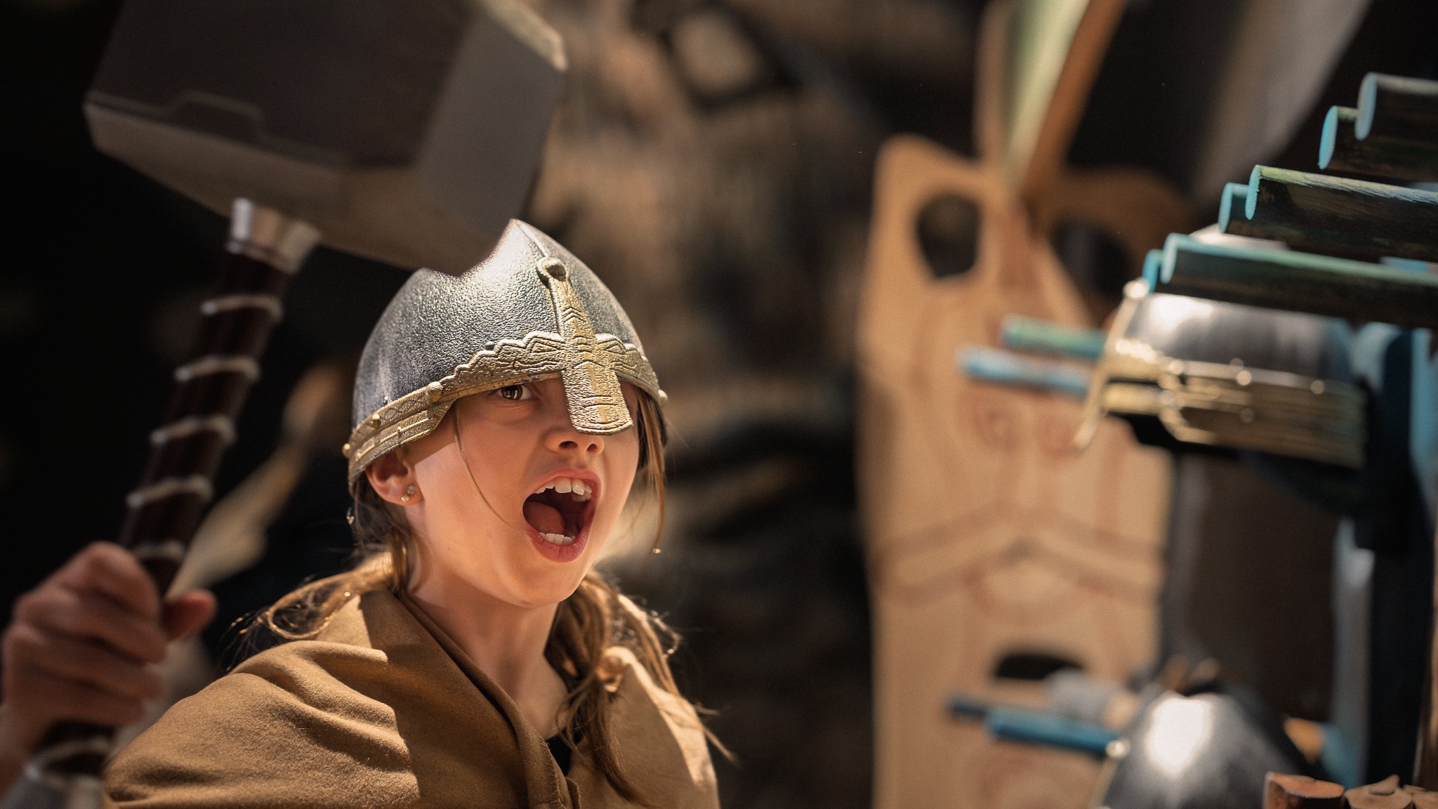Child in a knight's helmet