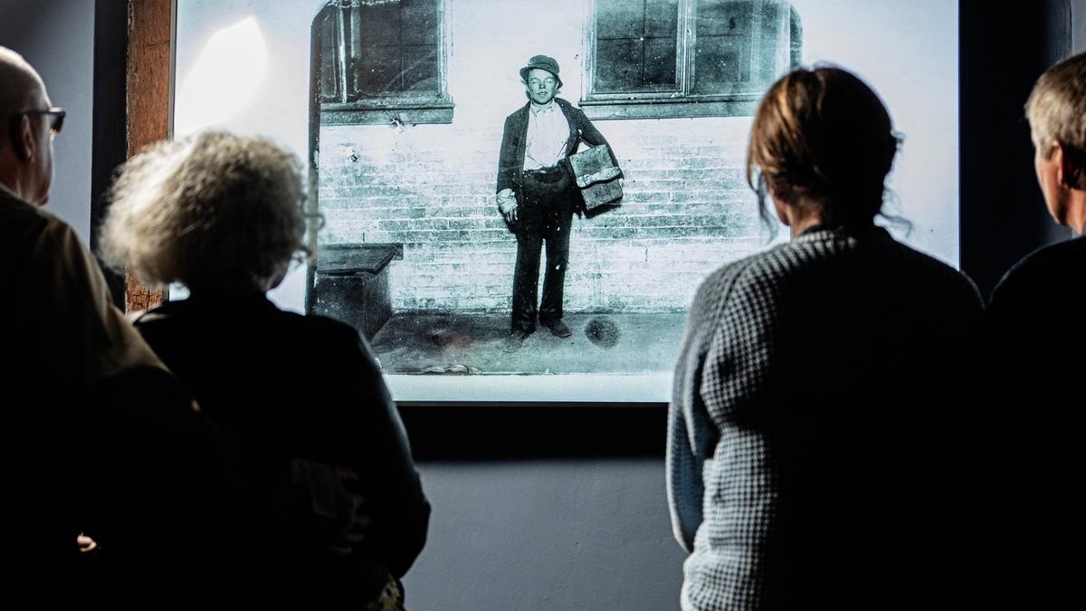 Visitors viewing a photo