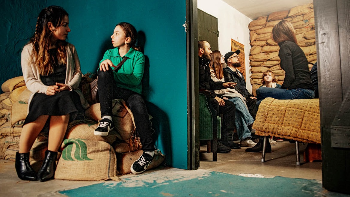 Conversations by sandbags