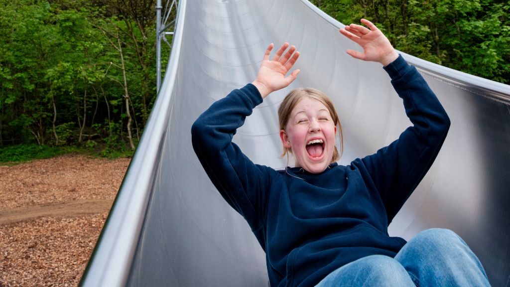 A girl is on her way down THE SPIDER at WOW PARK Skjern.