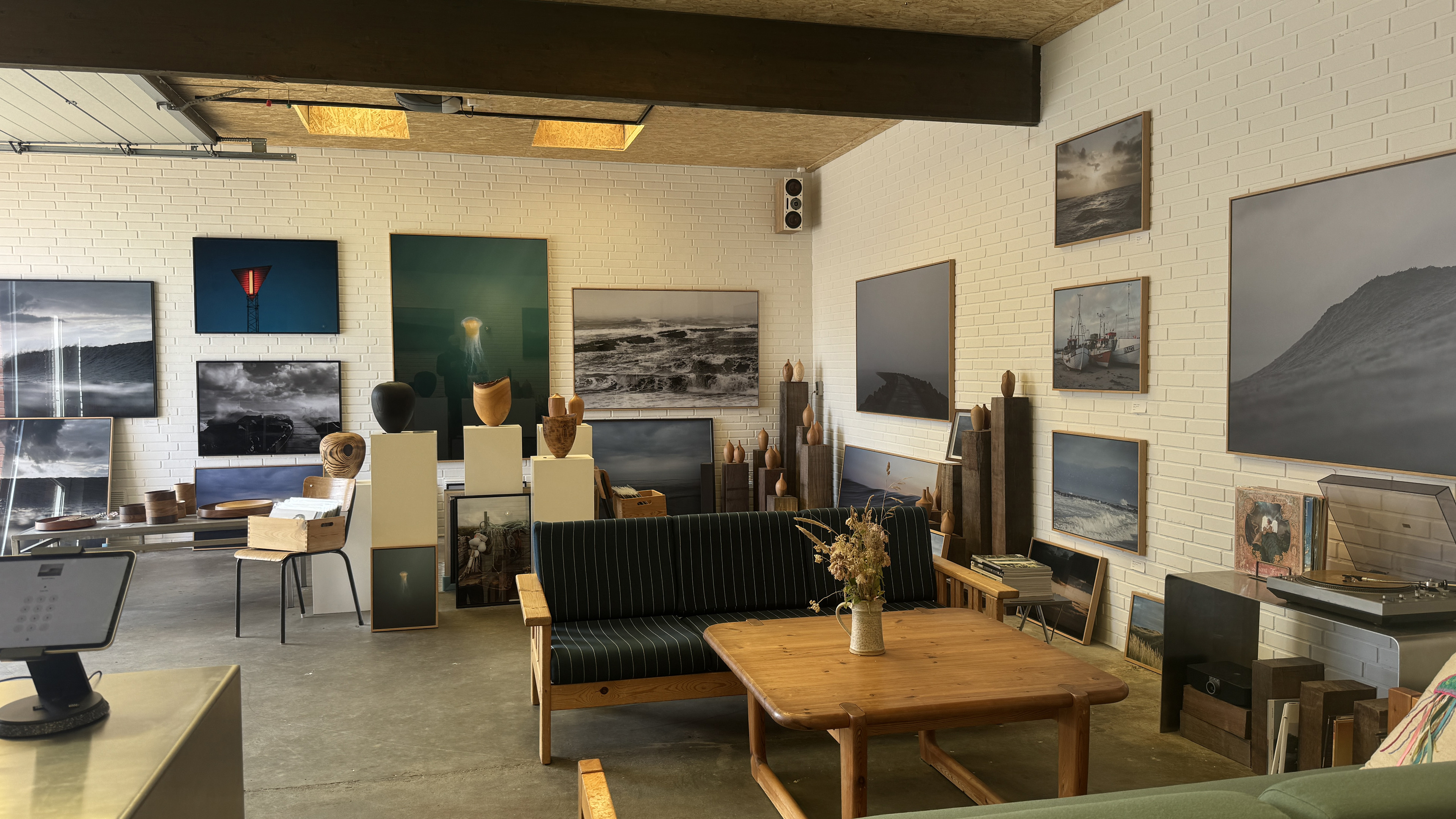 A welcoming gallery featuring photographs and arts and crafts inspired by the North Sea.
