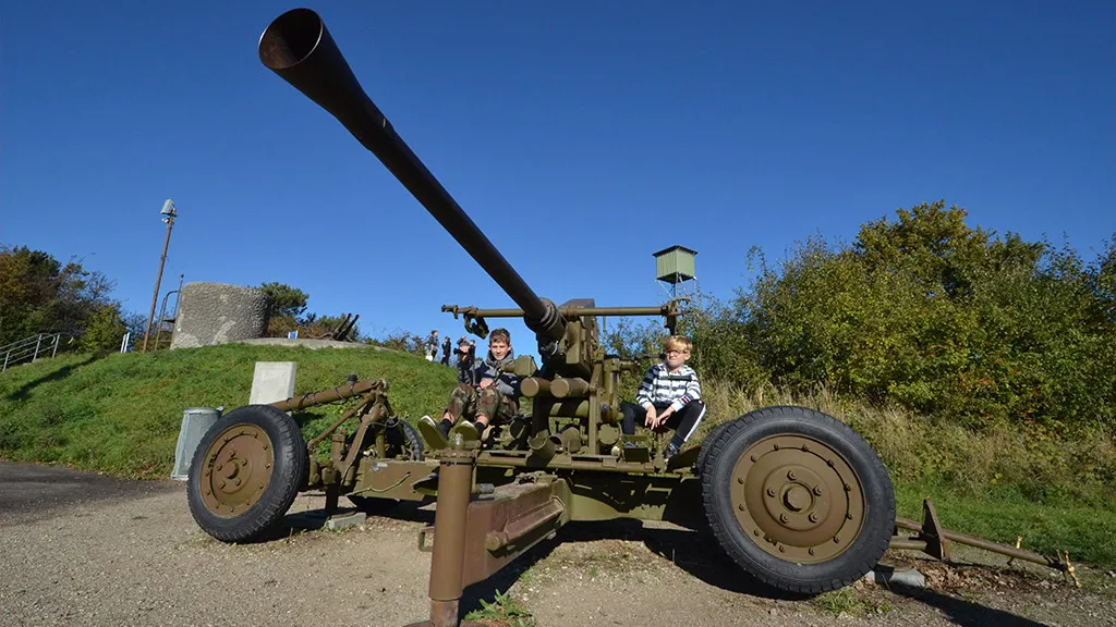Children try out cannons at Langelandsfortet