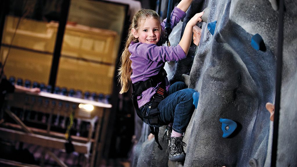 “Girl-having-fun-climbing-in-Lalandia.