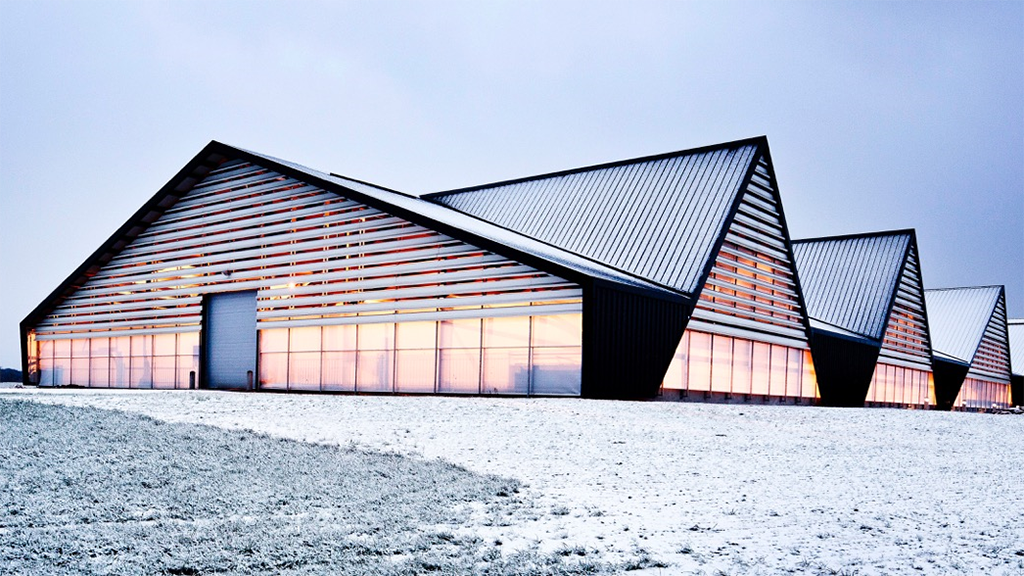 Snow outside with Vejlskovgaard Dairy in the background