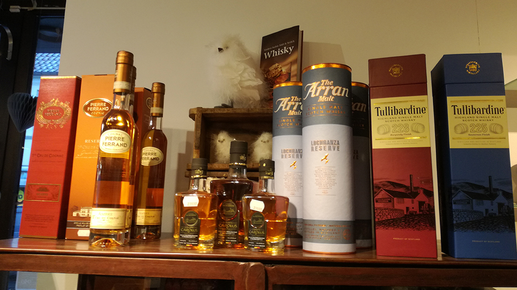 Whiskey on the shelves at Blas Kaffe & The in Odder