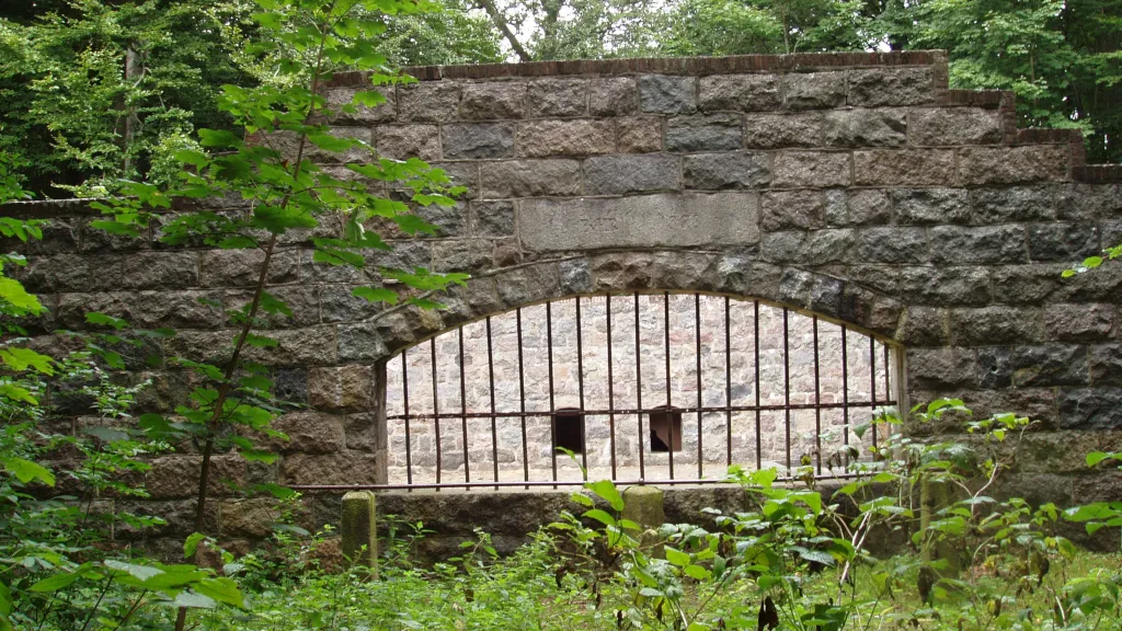Gate at the entrance to the bear cave near Odder